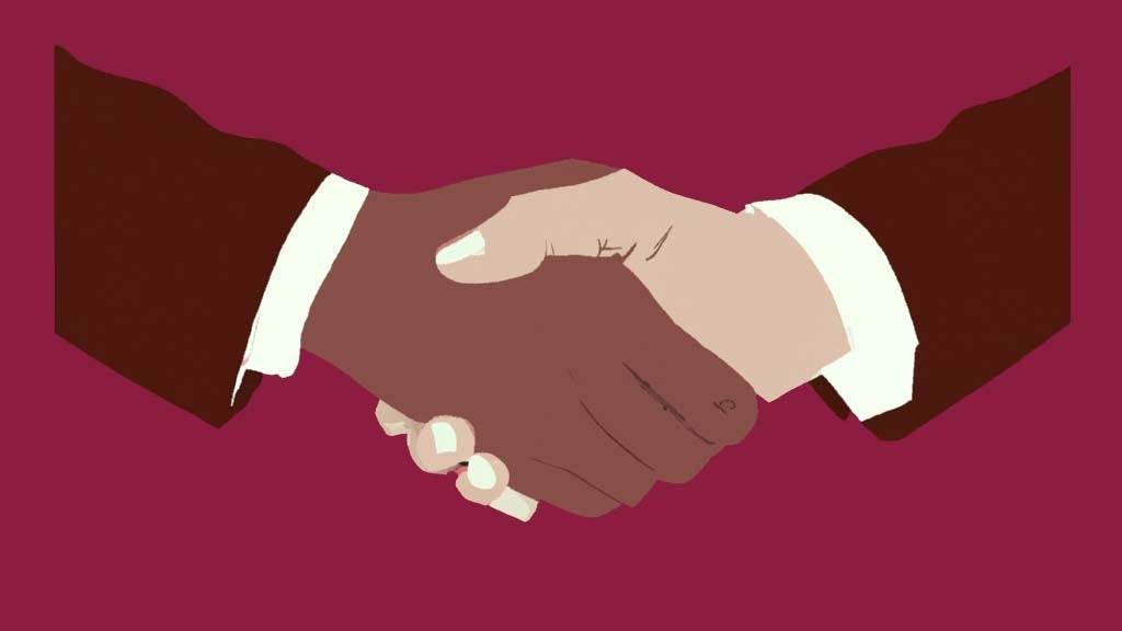 handshake on maroon background