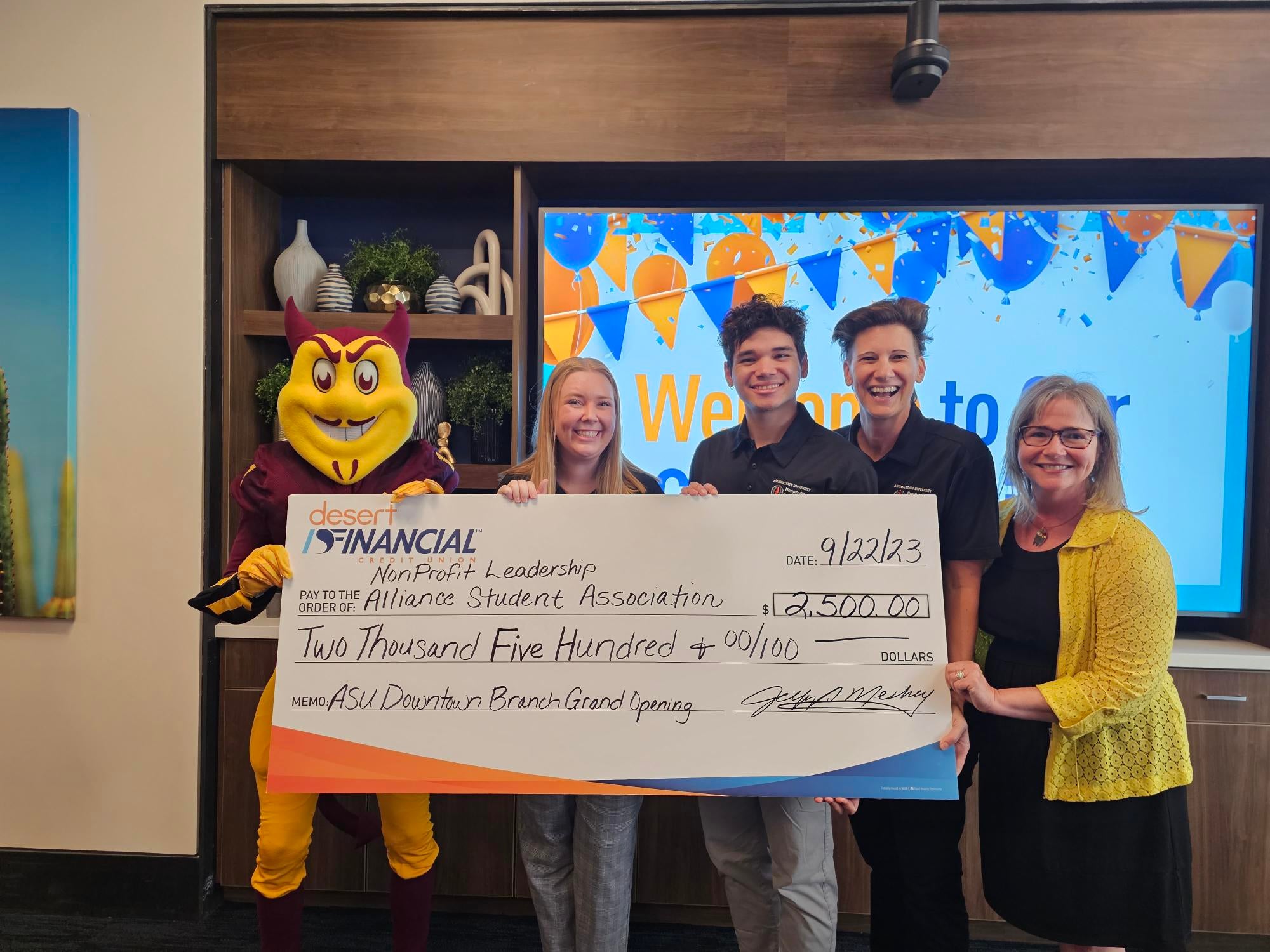 Sparky and Dean Amy Golden with NLASA students Emma Gibbs and Raine McAngus and advisor Anne Kotleba