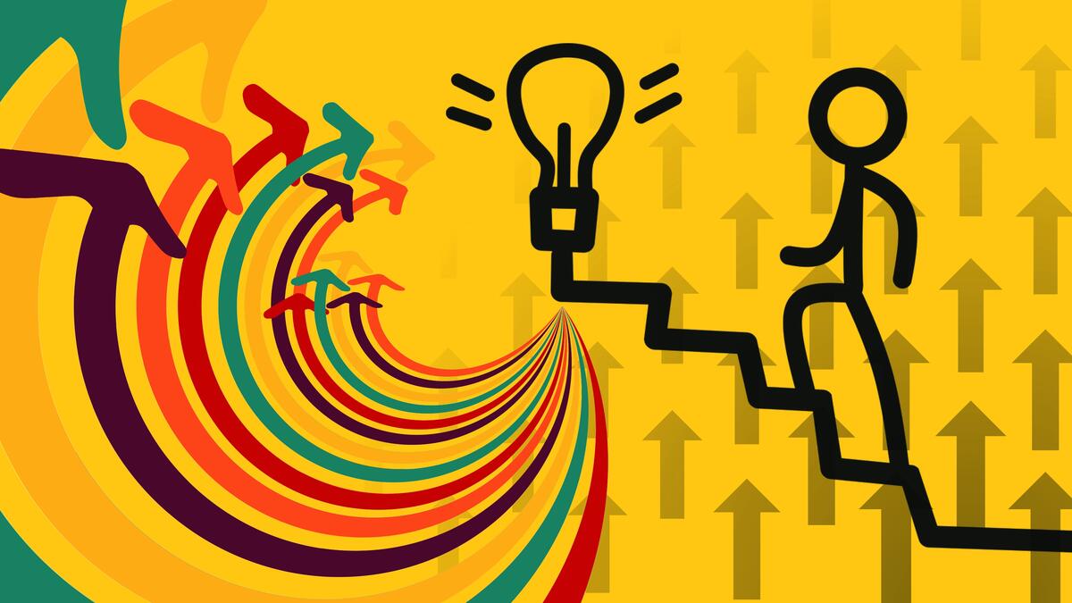 Illustration of a man walking up stairs toward a lightbulb