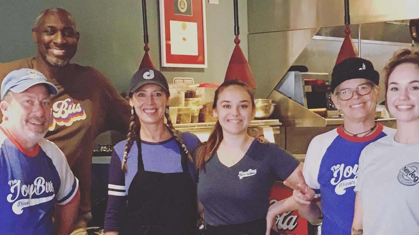 Jennifer Caraway, third from left, opened The Joy Bus Diner in Phoenix to support her nonprofit organization, which delivers chef-crafted meals to cancer patients. Photo courtesy Joy Bus.